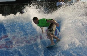 Teen surfing on the Flow Rider at Waterville in Gulf Shores