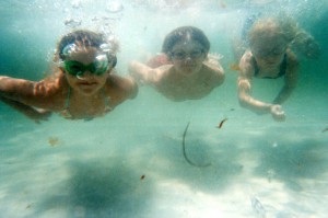 Kids snorkeling by the Destin jetties