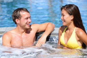 Couple enjoying a hot tub in mild Gulf Shores weather