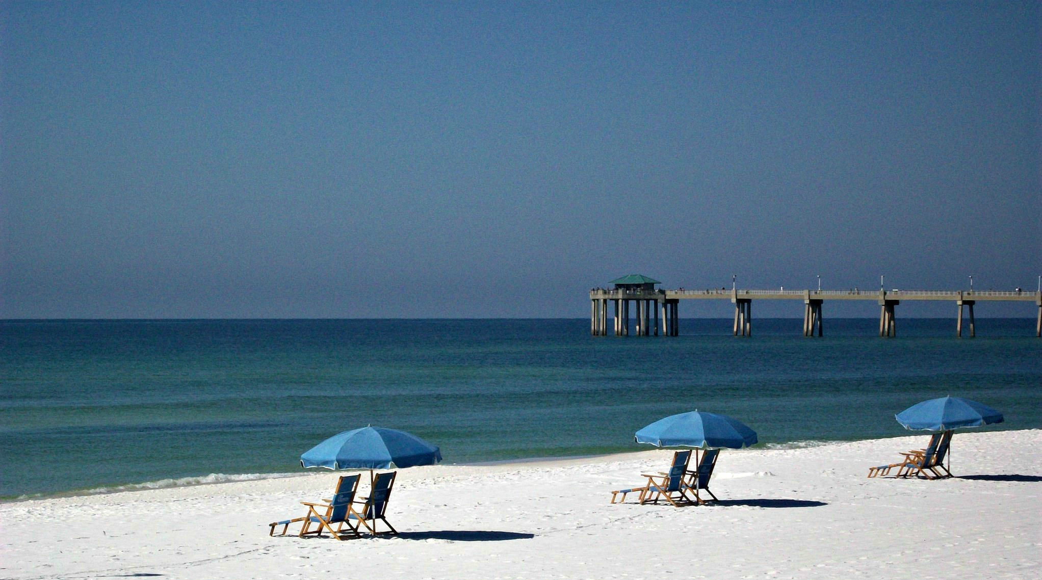 Beach umbrellas with a view of the Gulf at Seaspray Condominiums in Fort Walton Beach