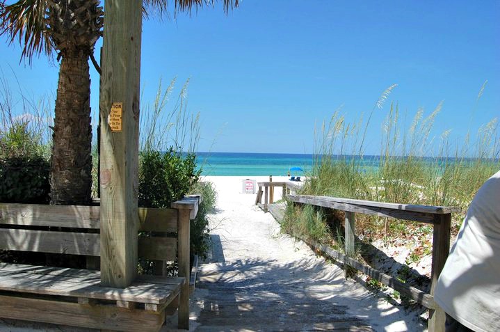 Boardwalk Beach Resort walkway over dunes and sea oats to beach and Gulf