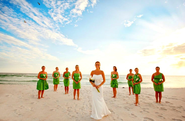 Bridal wedding party on the beach in front of Boardwalk Beach Resort