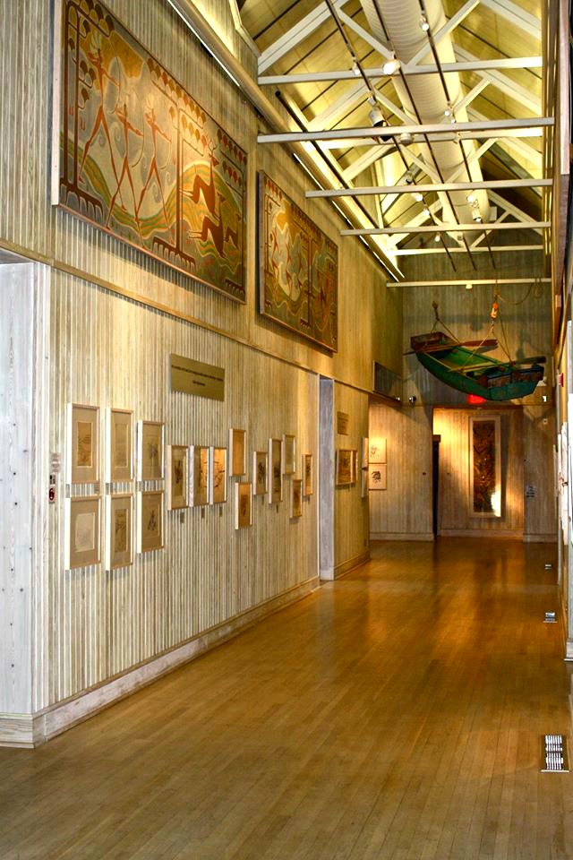 Painting-lined exhibit hall at Walter Anderson Museum of Art in Ocean Springs, Mississippi, one of ten easy day trips from Gulf Shores