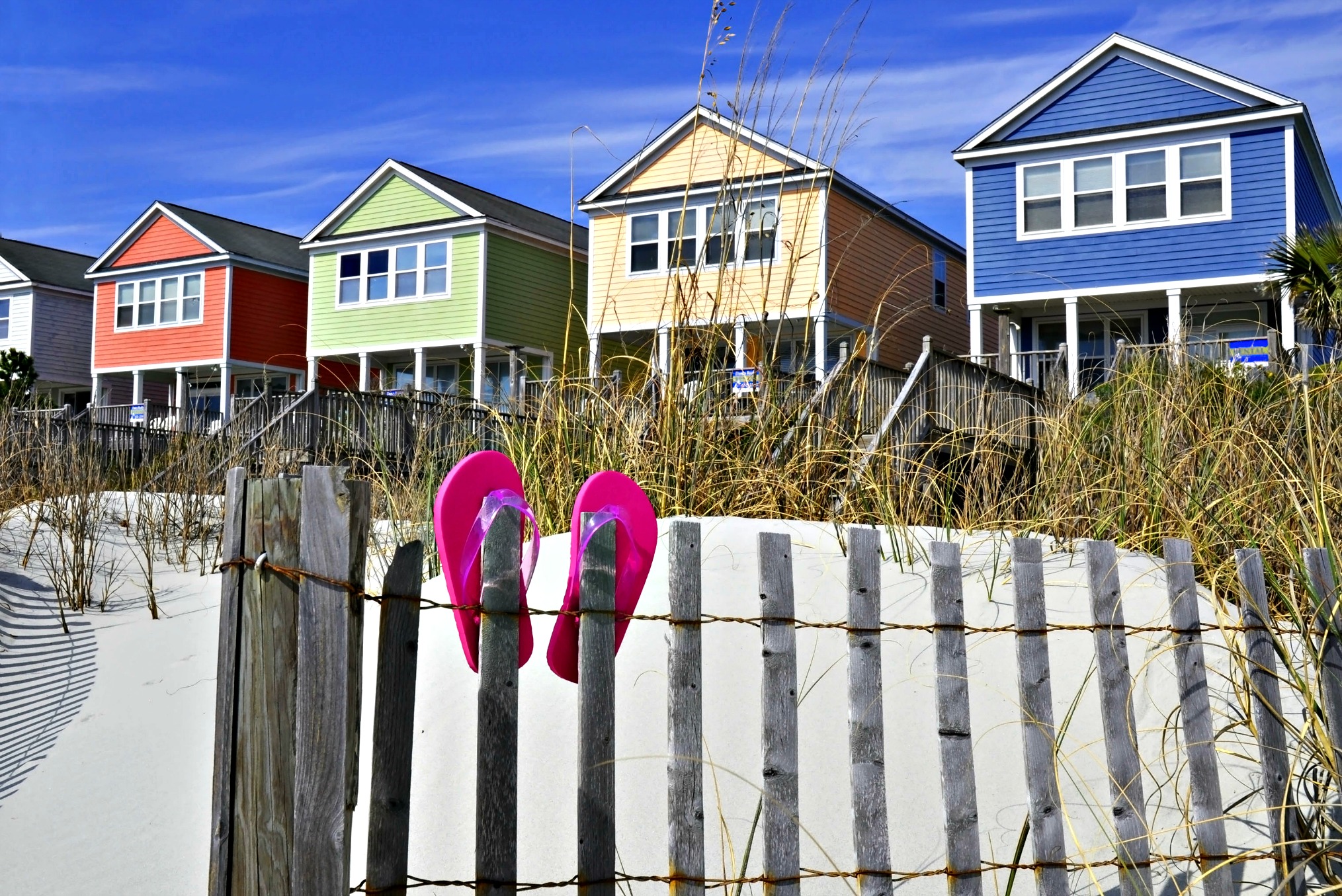 Row of colorful beach vacation rental house