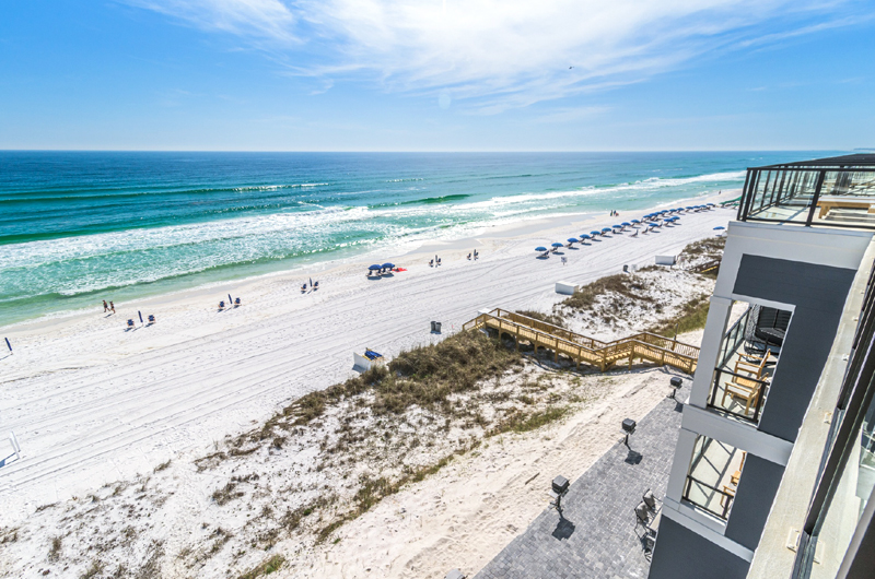 Each four-story townhome has it's own elevator and faces the beach.