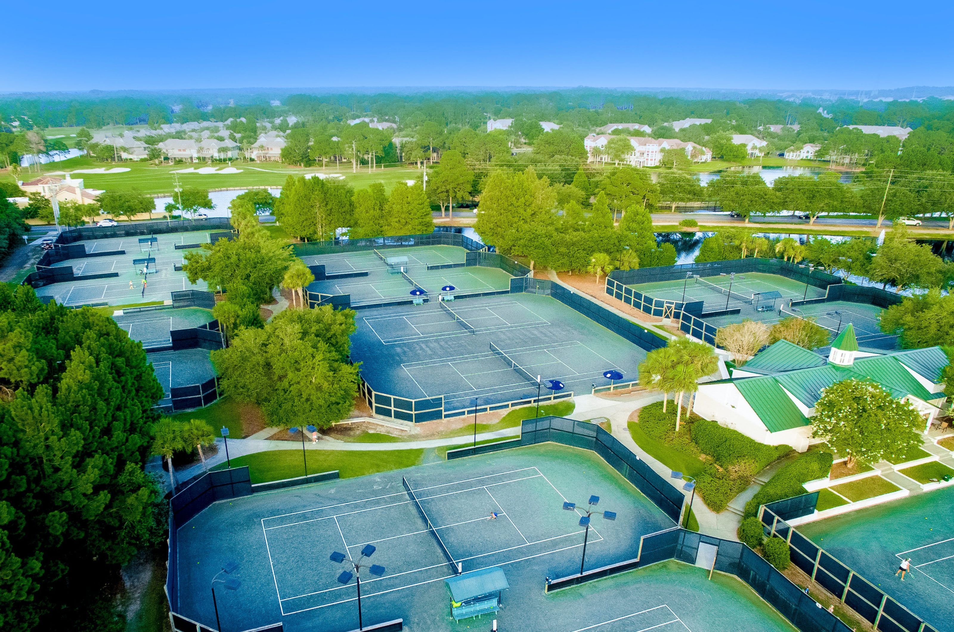 Aerial view of the tennis complex at Sandestin Golf and Beach Resort available for guests at Luau Resort