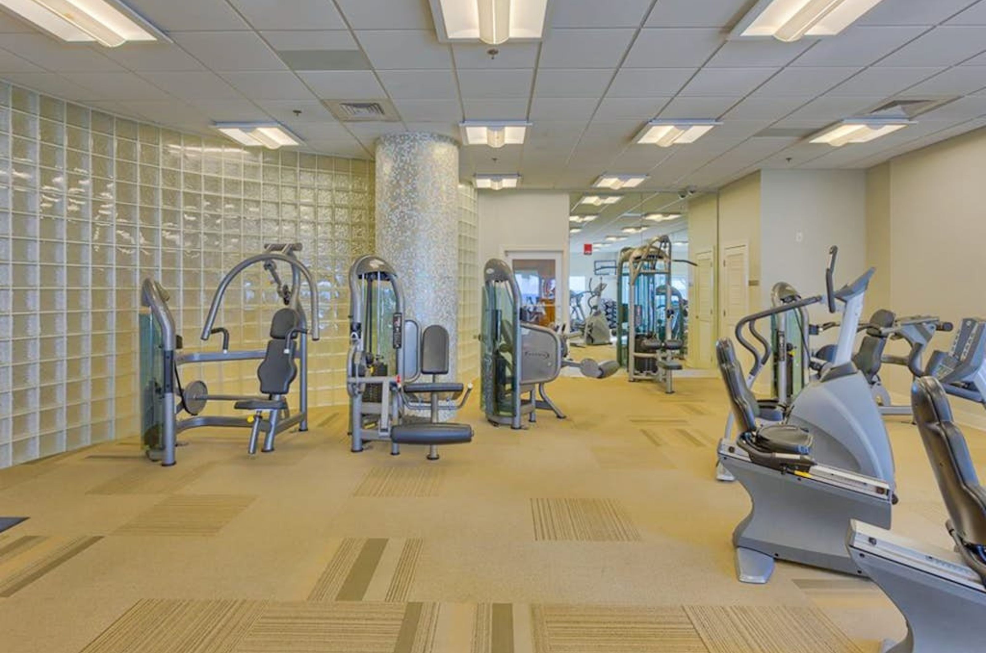 Strength and cardio equipment in the fitness center at Escapes to the Shores 
