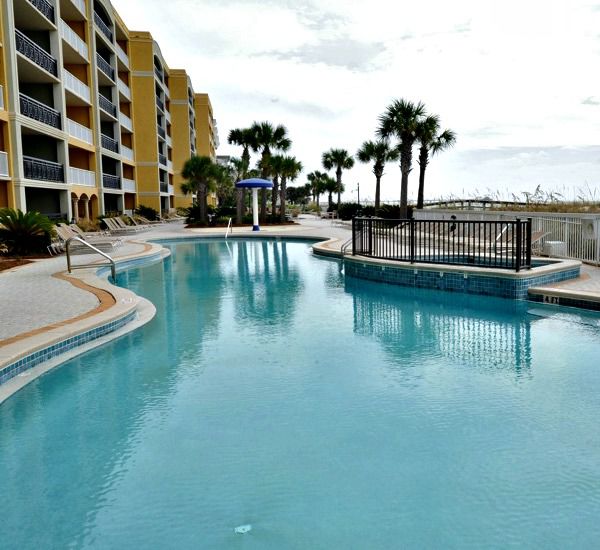 Gulf-front swimming pool and mushroom fountain at Azure Fort Walton Beach