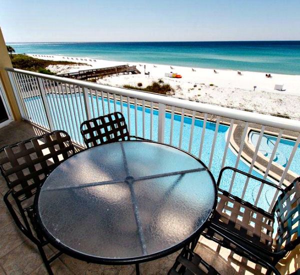 Gulf-front balcony overlooking the pool and beach at Waters Edge Condos in Fort Walton Florida