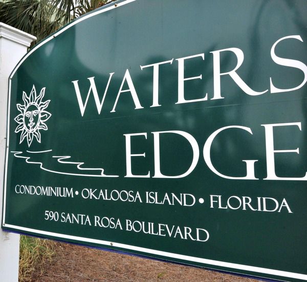 Street-side sign at Waters Edge Condos in Fort Walton Florida