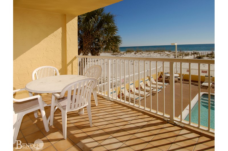 View of the pool and beach from a private balcony at Driftwood Towers Gulf Shores