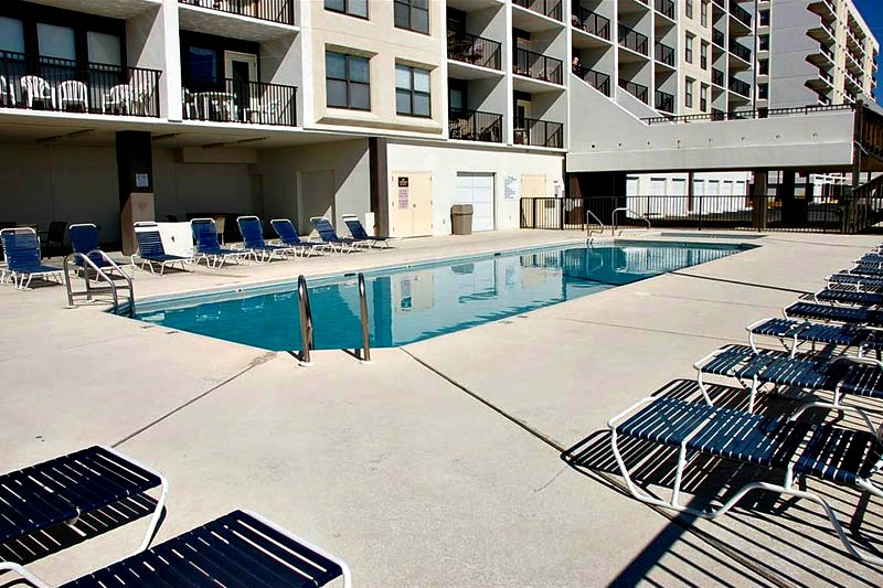 Swimming pool and sundeck at Island Sunrise Gulf Shores
