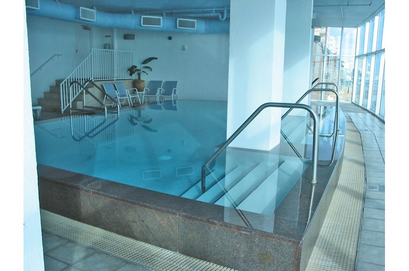 indoor pool with beach view at Island Tower Gulf Shores