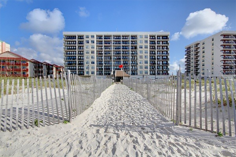View of the building from the beach at Island Winds West in Gulf Shores AL