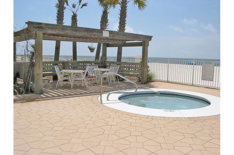 Relax and let your cares soak away in the hot tub at Ocean House Gulf Shores.
