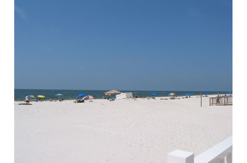 Private white-sand beach at Ocean House Gulf Shores