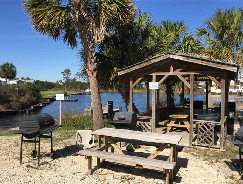 Grill your family dinner and enjoy a view of the water at The Cove in Gulf Shores Alabama