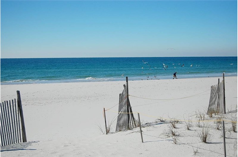 Gorgeous white sands right outside your condo at Tropical Winds Gulf Shores AL