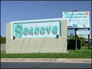 Building signage at the Seacove Condominium and Townhomes in Destin Florida